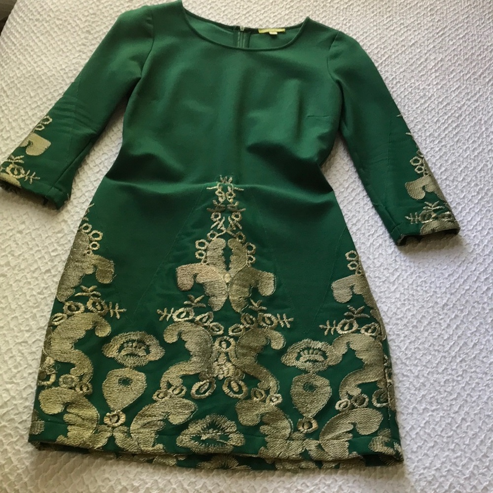 Green dress with gold applications